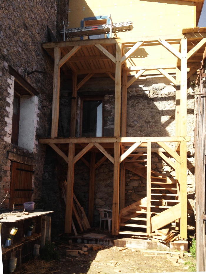 Extension de maison avec terrasses et accès
